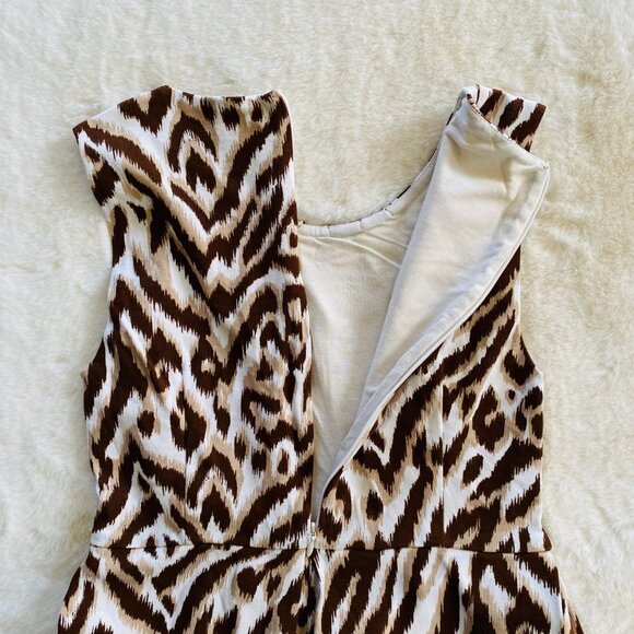 Women's Leopard Print Peplum Sleeveless Top Size XS Excellent Condition - Picture 7 of 10